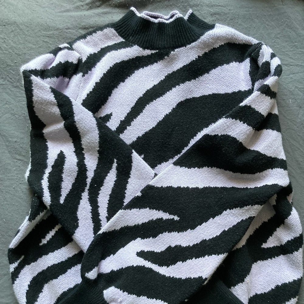 Who you wear blacks and lavender zebra sweater